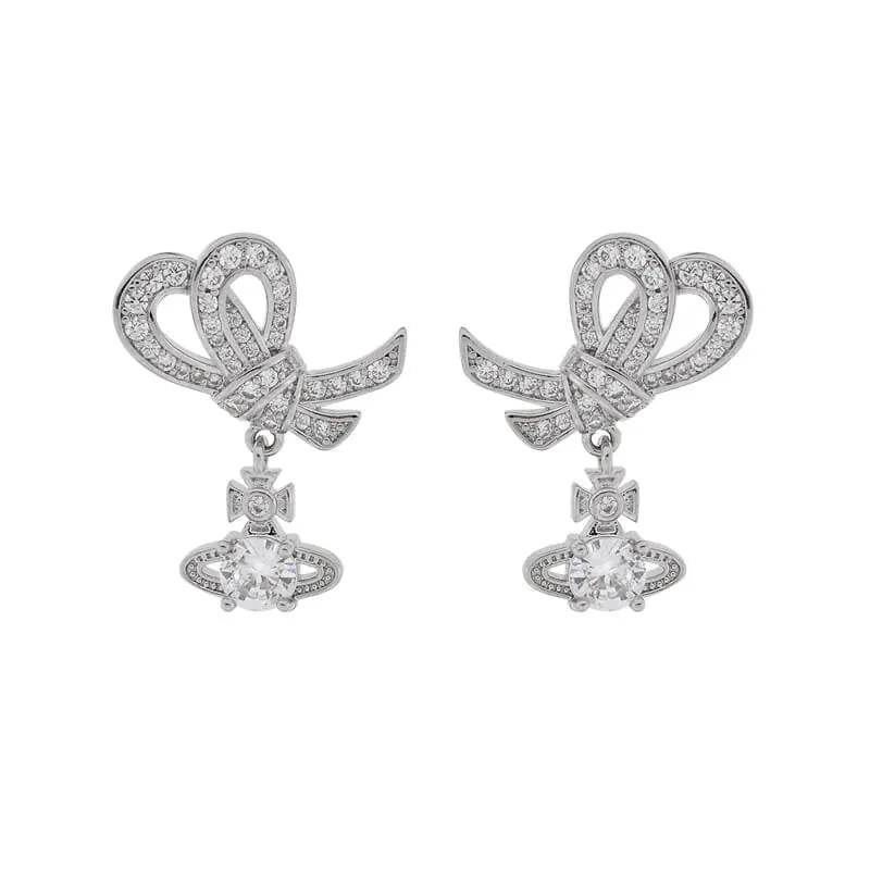Bow & Four‑Prong Saturn Diamond Drop Earrings