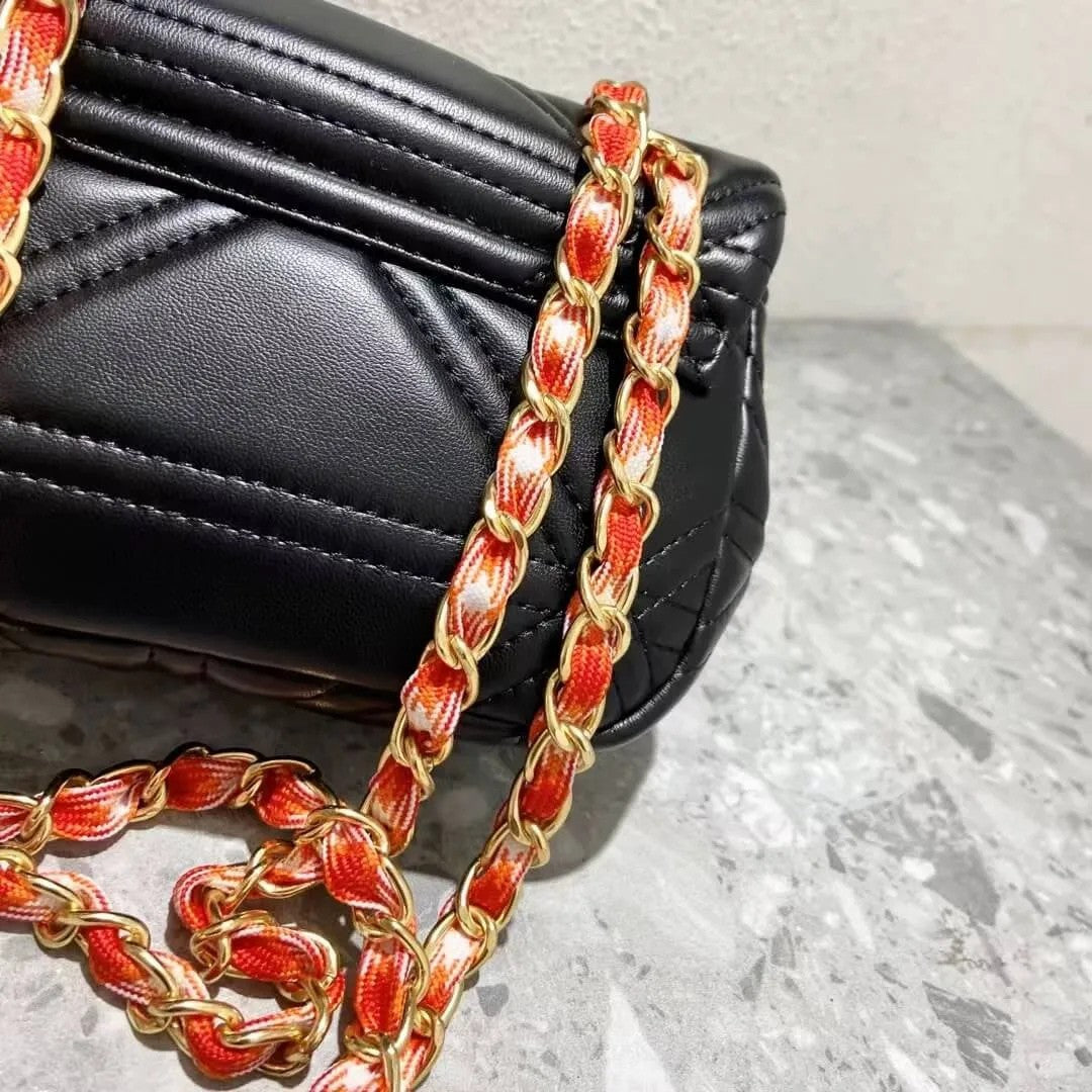 Quilted Saturn Crossbody Bag