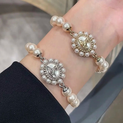 Ornate Pearl Emblem Bracelet