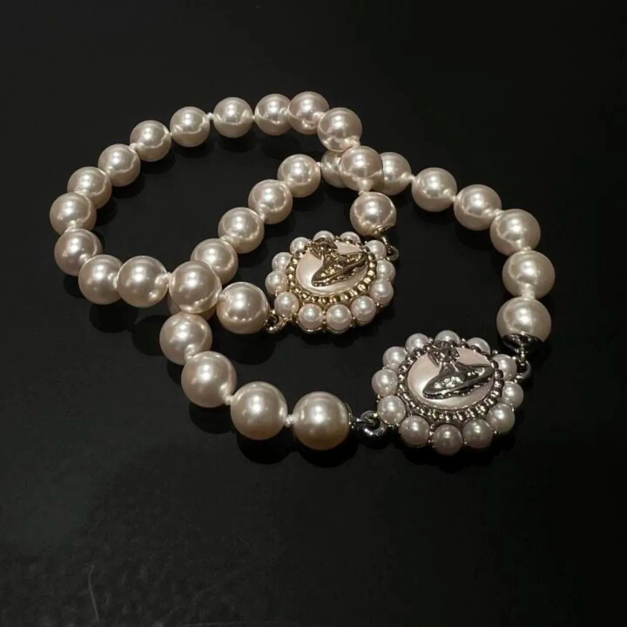 Ornate Pearl Emblem Bracelet