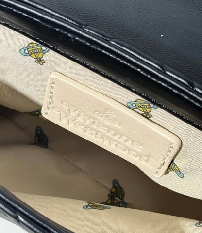 Quilted Saturn Crossbody Bag