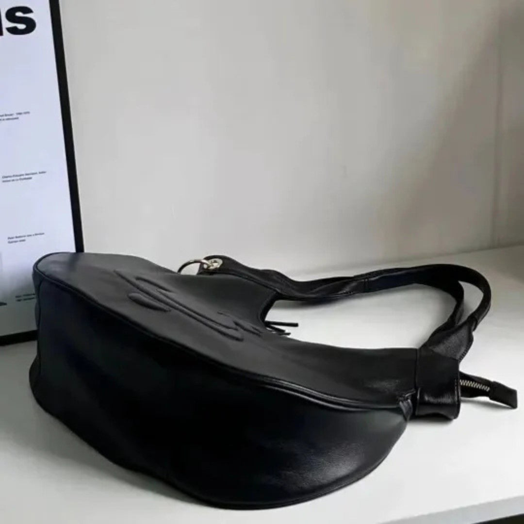 Curved Saturn Leather Bag