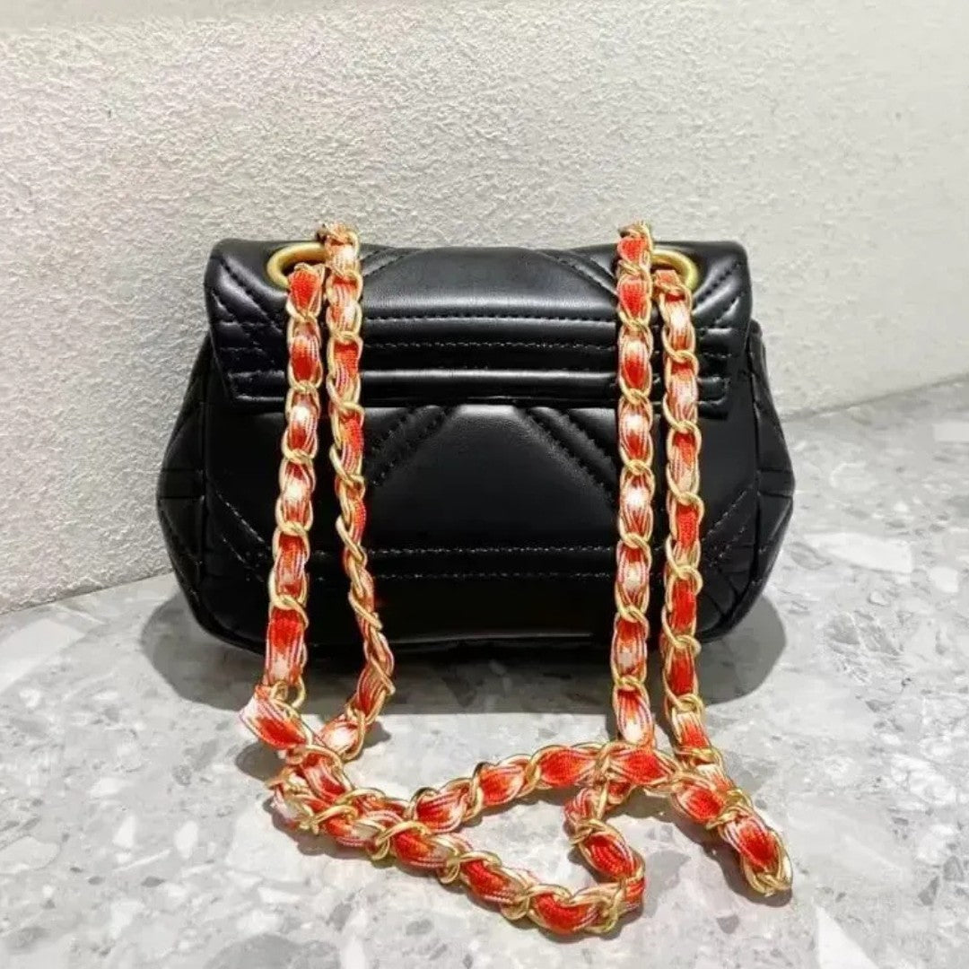 Quilted Saturn Crossbody Bag