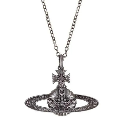 Antique Silver Carved Saturn Necklace