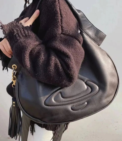 Curved Saturn Leather Bag