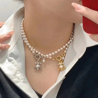 MARIALENA Nautical Pearl Necklace with Anchor & Orb Pendant