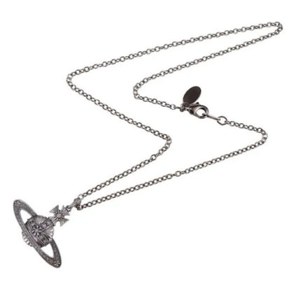 Antique Silver Carved Saturn Necklace