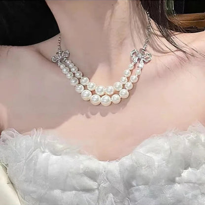 Double Ribbon Pearl Necklace