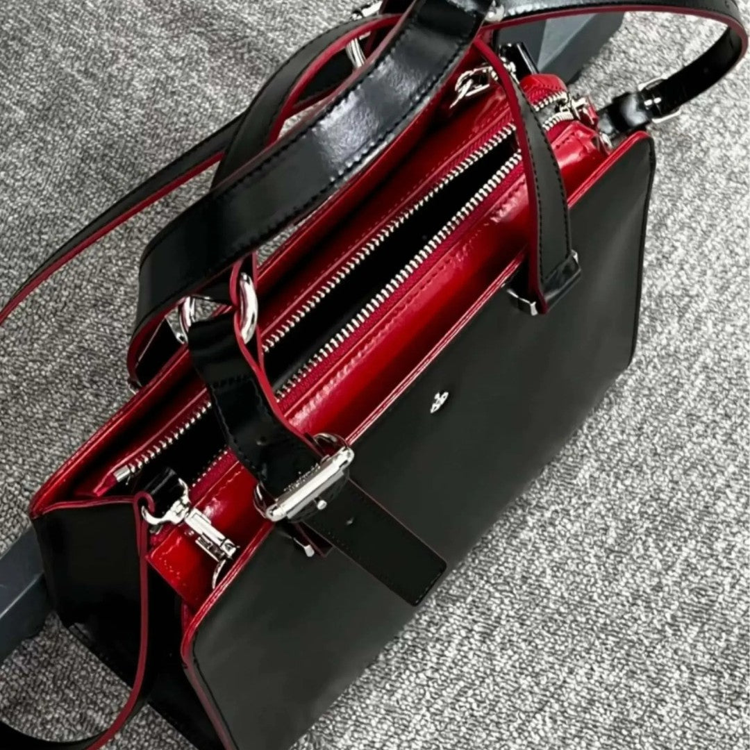 Modern Saturn Leather Handbag