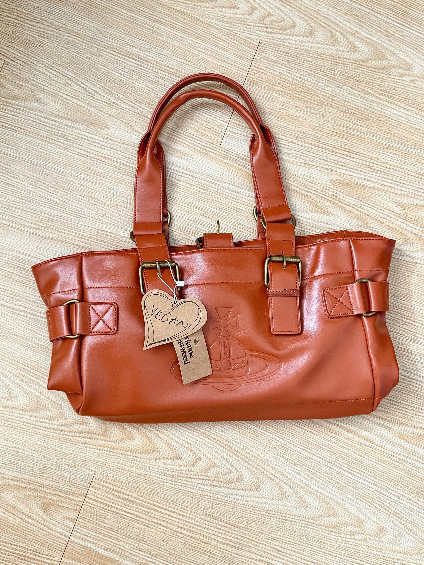 burnt orange Vwnana’s leather messenger bag (with dust bag) + free cardholder gift