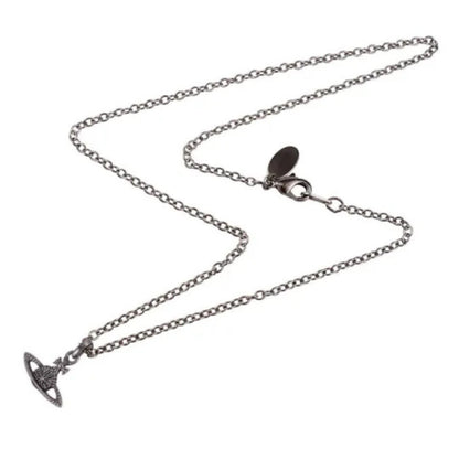 Antique Silver Carved Saturn Necklace