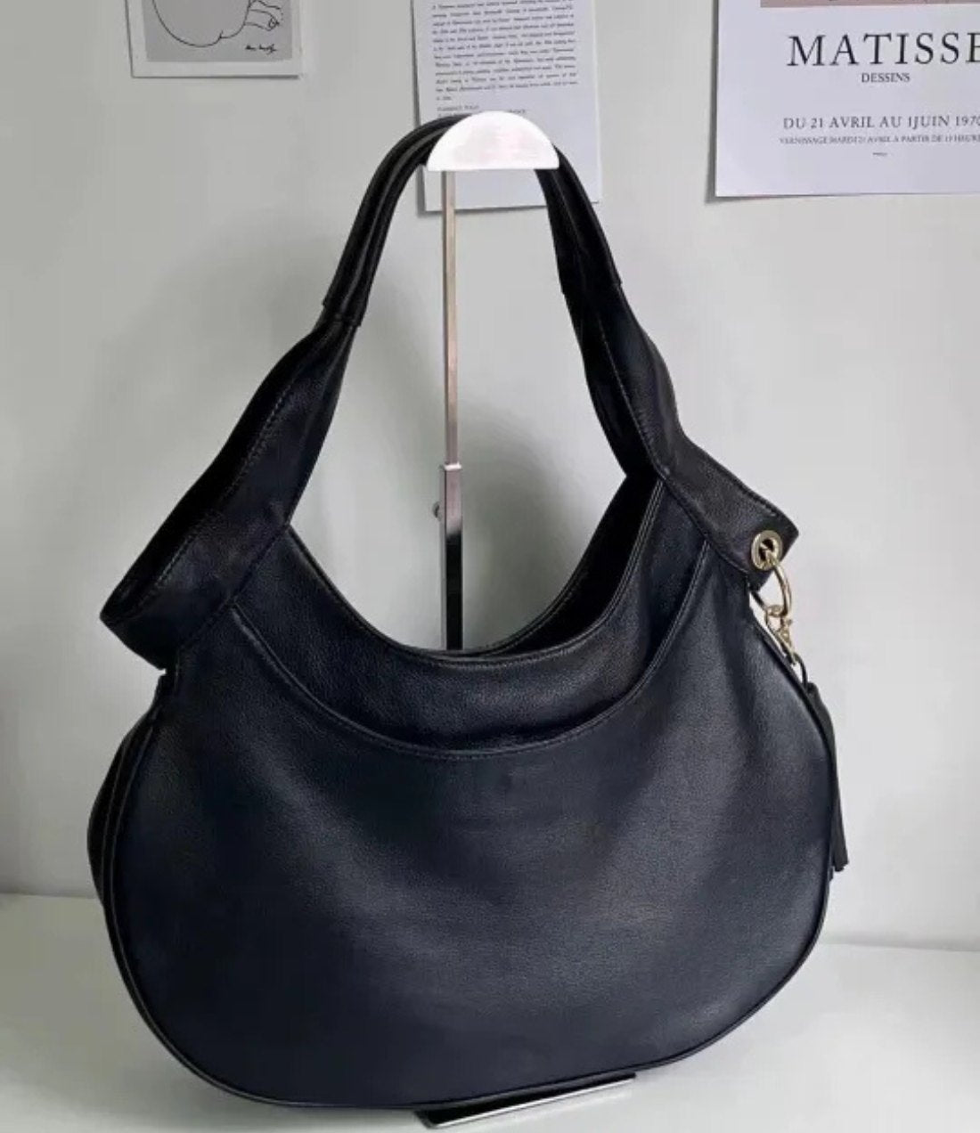 Curved Saturn Leather Bag