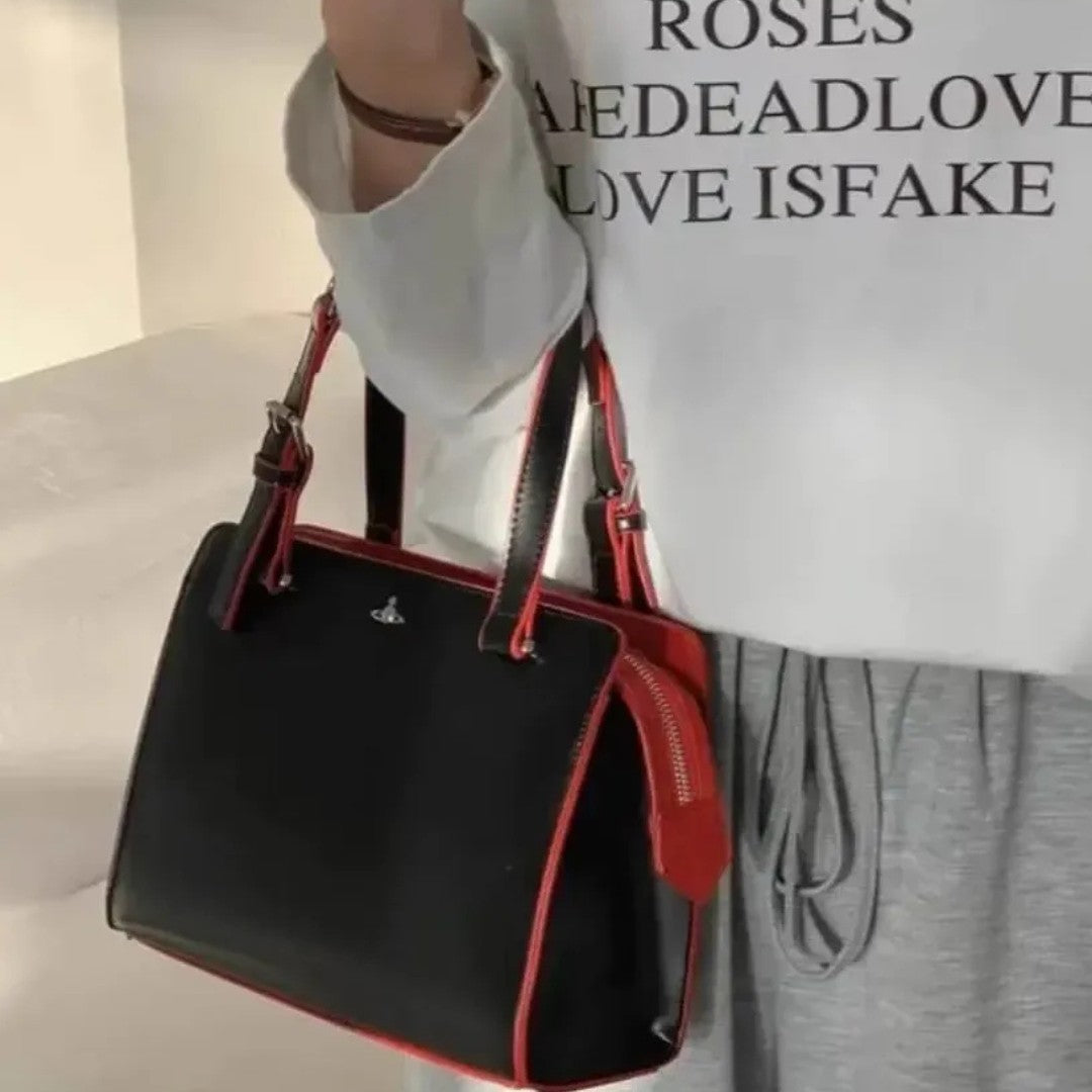 Modern Saturn Leather Handbag