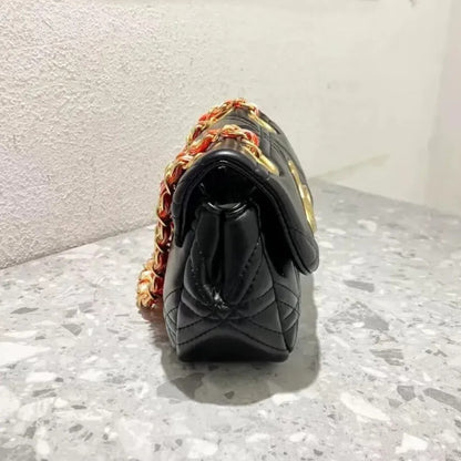 Quilted Saturn Crossbody Bag