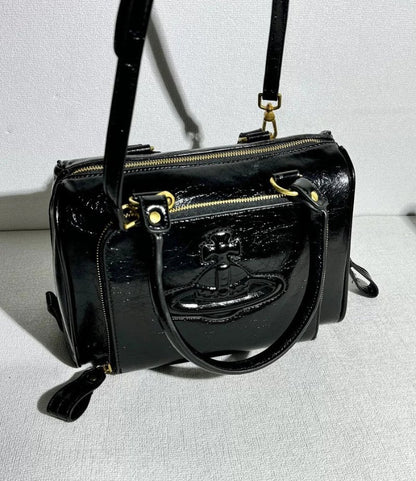 Structured Leather Boston Bag with Saturn Emblem