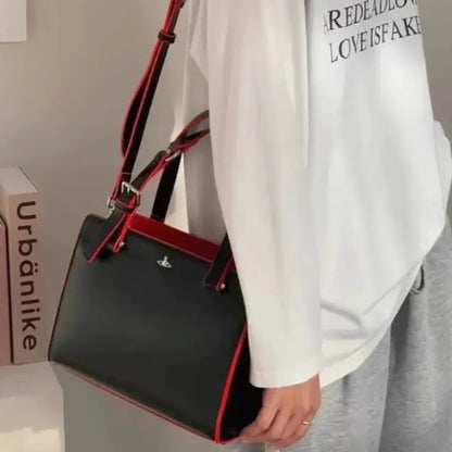 Modern Saturn Leather Handbag