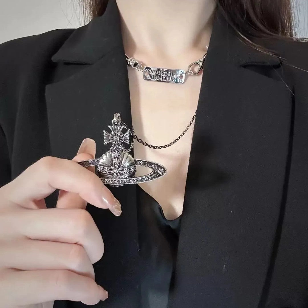 Antique Silver Carved Saturn Necklace