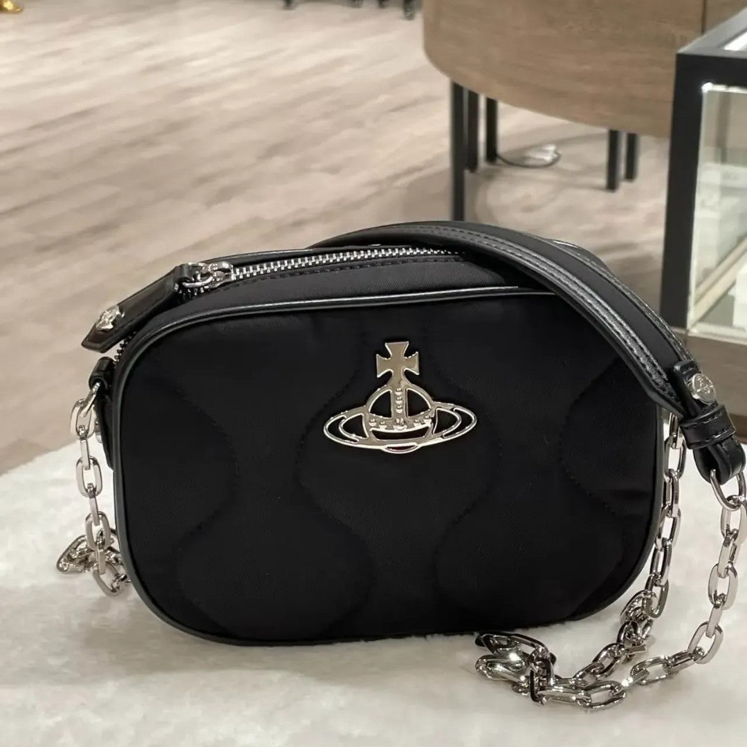 Compact Quilted Saturn Crossbody