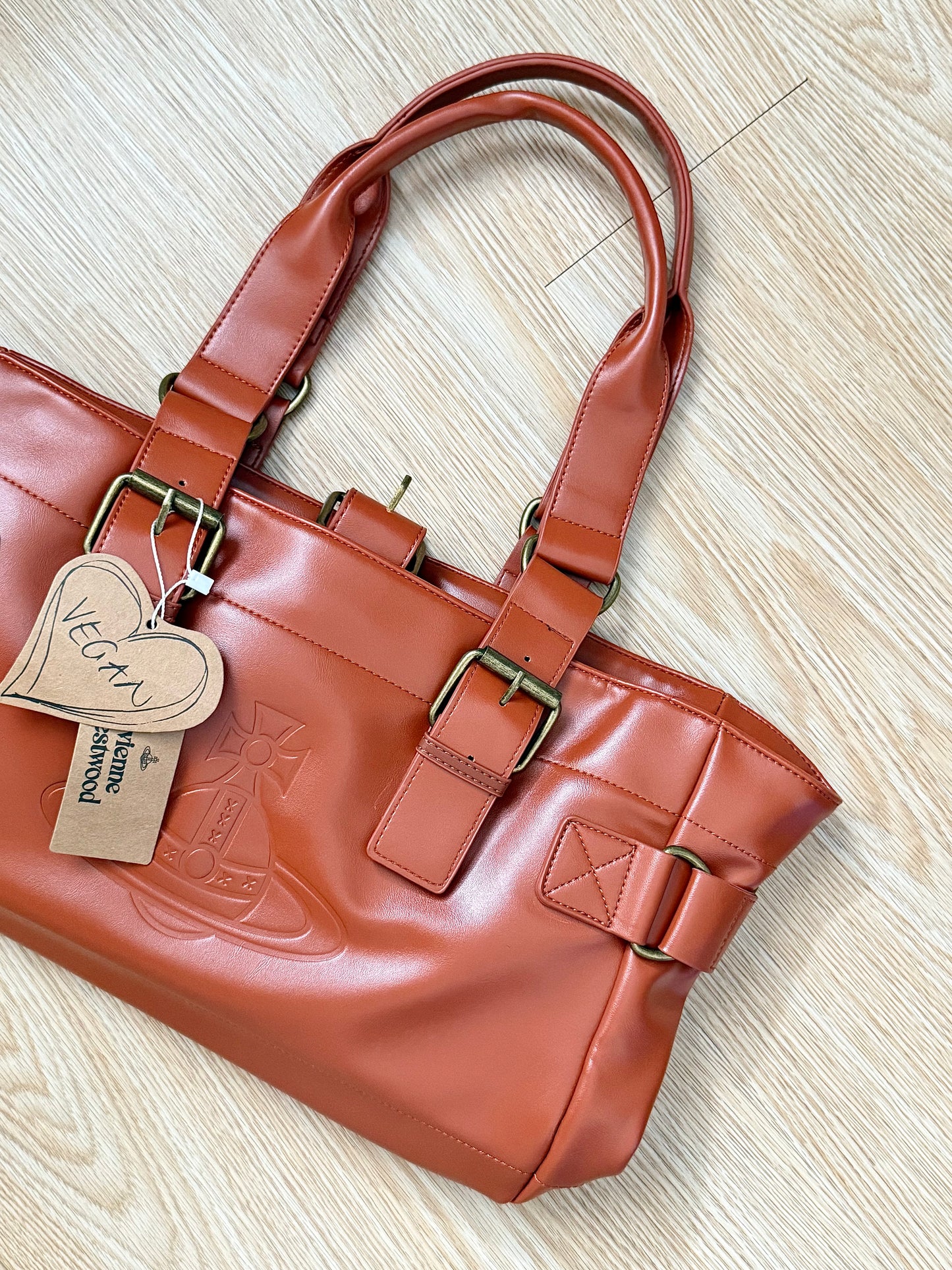 burnt orange Vwnana’s leather messenger bag (with dust bag) + free cardholder gift