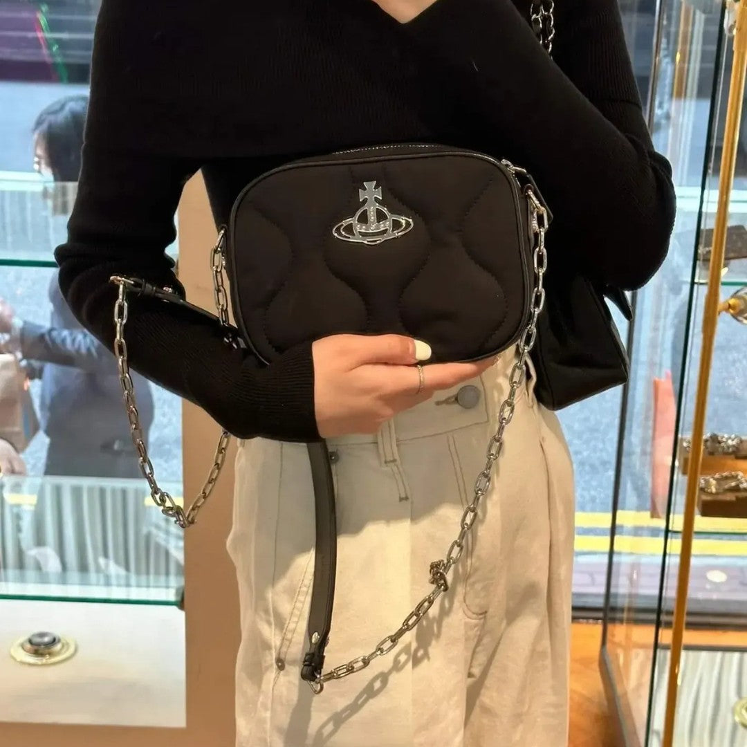 Compact Quilted Saturn Crossbody