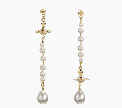 Broken pearl earrings (with box)