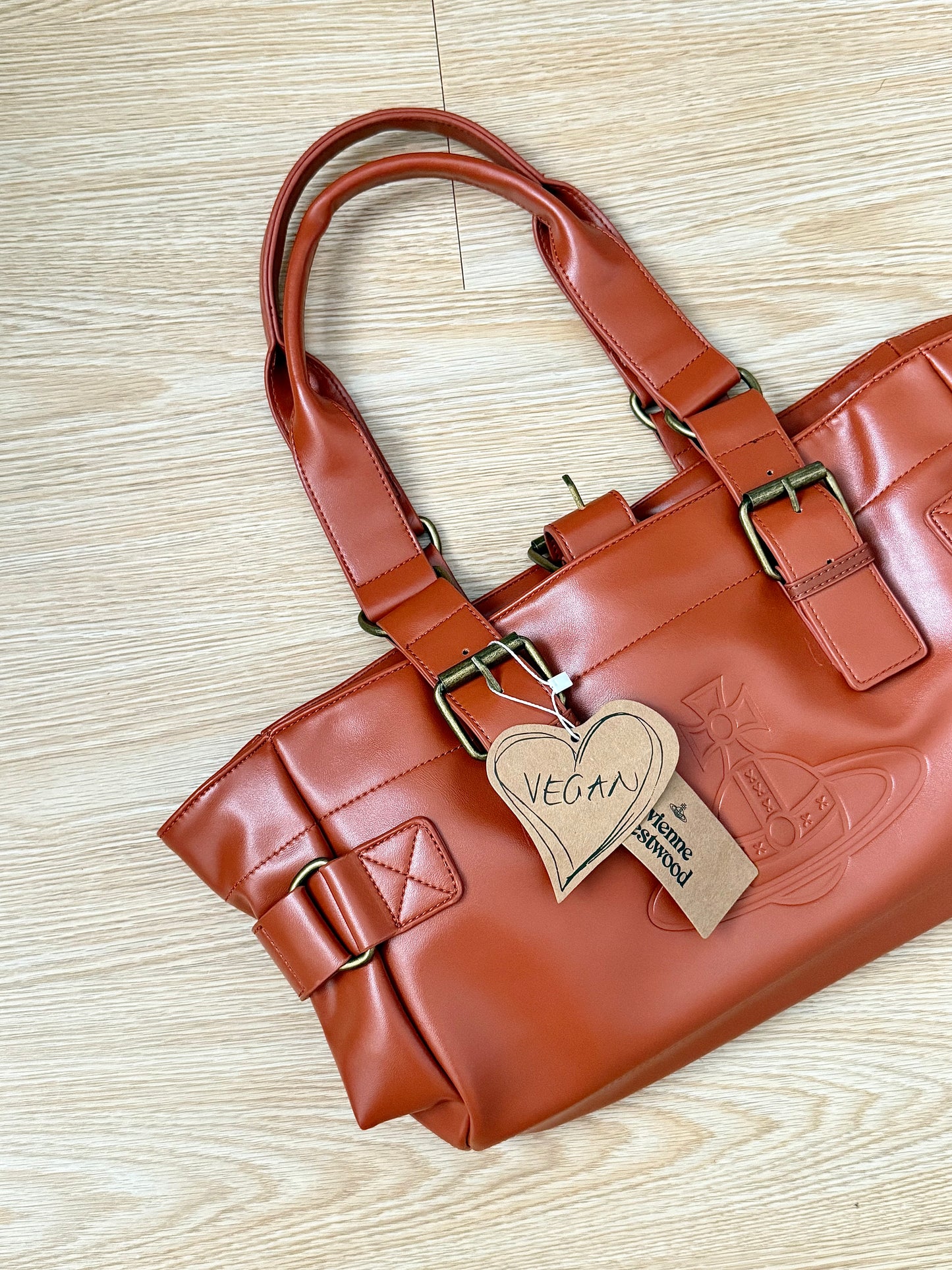 burnt orange Vwnana’s leather messenger bag (with dust bag) + free cardholder gift